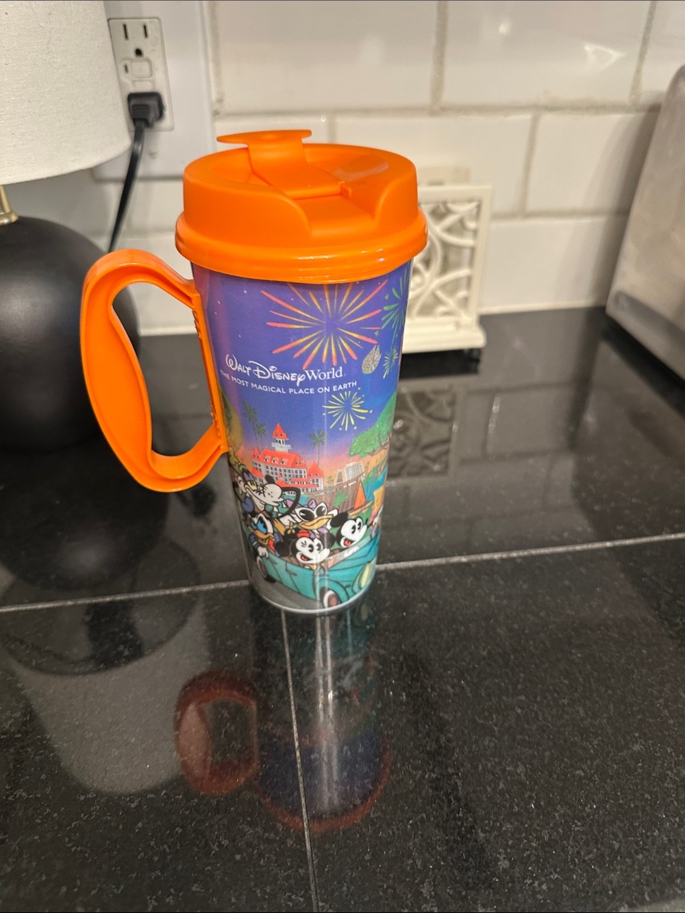 Disney Blue Park Fireworks Travel Tumbler with Orange Lid and Handle